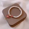 Charm armband avgift how trendig naturlig sötvatten pärlpärlor armband för kvinnor rosa färg pengar ficka bröllopstillbehör