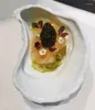 Plattor keramiska ostron maträtt molekylär kök bordsartiklar kreativa el restaurangklubb högklassig ren vit specialformad