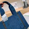 Bolsa de compras de lona Bolsas de grande capacidade para mulheres jeans de salão azul de ombro de ombro clássico letra de fivela magnética slot slot bolso de bolso bolsa