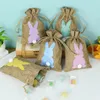 24 pz Coniglietto di Pasqua Sacchetti di caramelle di tela con coulisse Coniglio Sacchetti di stoccaggio in lino Bomboniere di Pasqua Decorazione Confezione regalo Borsa FY5654 ss0130