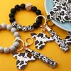 Llaveros Llavero de pulsera inicial de vaca cursiva con billetera de PU Impresión de mamá Brazalete Llavero de silicona Encantos personalizados Regalo