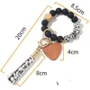 Вечеринка FedEx 14 Colors Love Wood Chip Bracelet Bracelet Breastlet Ключевой цепь Sile Bead Tassels Tassel