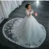African Dubai Elegant Long Sleeves A-Line Wedding Dresses Sheer Crew Neck Lace Appliques Beaded Vestios De Novia Bridal Gowns with Buttons Plus Size BA4150