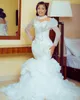 2023 Sexy Luxury Mermaid Wedding Dresses African High Neck Illusion Lace Appliques Crystal Beading Long Sleeves Vestidos De Novia Bridal Gowns Ruffles Tiered