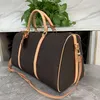Kilit büyük kapasiteli spor çantası ile 2023 Duffel Çanta moda erkek kadın seyahat çantaları marka tasarımcısı bagaj çanta