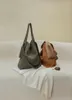 Den senaste pipi pendlingsväska hängande öron tote väska stor kapacitet singel axel crossbody väska kvinnor väska