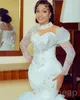 2023 Sexy Luxury Mermaid Wedding Dresses African High Neck Illusion Lace Appliques Crystal Beading Long Sleeves Vestidos De Novia Bridal Gowns Ruffles Tiered