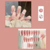 Unghie finte 24Pcs Scolorimento a forma di cuore Fiocco Lungo Bara Ballerina indossabile Falso Copertura completa Punte per unghie Premere su