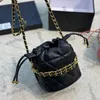 23C French Womens Cowhide Vanity Drawstring Bags Black Pink Bucket Bracelet Chain Handle Totes Gold Metal Hardware Matelasse Crossbody Shoulder Handbags 14X13CM