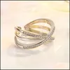 С боковыми камнями белое золото простые серные кольцевые геометрические бусинки, подходящие для женских творческих линий.
