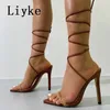 Witte sandalen voor vrouwen modeketendecoratie pvc transparante open teen enkel veter omhoog hoge hakken dames zomerschoenen 0129