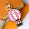 Dise￱adores Keychains con caja Luxurys Keychain de cuero Cartoon Air globos de aire caliente Estilo casual Temperamento de cadena de llave vers￡til Popular Bolso colgante
