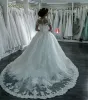 African Dubai Elegante maniche lunghe A-Line Abiti da sposa Girocollo trasparente Appliques in pizzo Vestios De Novia con perline Abiti da sposa con bottoni Taglie forti BA4150