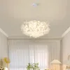 Ljuskronor modern kreativ sovrum vita kronblad varm romantisk heminredning hängande lampa vardagsrum matbord ljuskrona led