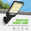 Lâmpadas solares da lâmpada de parede Luzes de rua ao ar livre com 3 Light Modo Impermeável Sensor de movimento para o caminho do pátio do jardim 2pcs