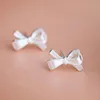 Boucles d'oreilles vente Simple élégant mignon couleur argent nœud papillon pour filles femmes enfants cadeau d'anniversaire beaux bijoux