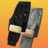 Dames broek herfst winter warme casual dames fleece dikke broek elastische taille trekkoord zweetwedstrijden heren losse sportkleding