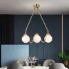 Lampadari Lampadario moderno in vetro a sfera rotonda Lampada a LED per isola cucina Sospensione di lusso Soggiorno Lampare di illuminazione a forma lunga