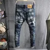 Erkekler kot moda tasarımcısı retro mavi ince fit streç yırtılmış delik pantolonlar hip hop yamalı denim bisikletçisi pantolon hombre 230131