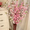 Fleurs décoratives 1pc cerisier artificiel printemps prune fleur de pêcher branche fleur en soie maison mariage en plastique Bouquet 65CM