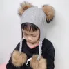 Bérets véritable fourrure pompon bébé chapeau avec oreilles oreillette casquette hiver laine tricoté chapeaux pour enfants enfant en bas âge Skullies bonnets