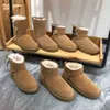 2023 Bootsdesigner Uggit Women Booties Classic Australia Snow Stiefel -Knöchel -Mini -Kurzschluderfell Winter schwarzer Kastanien -Bowtie Luxurys Fashions Uggit 2023