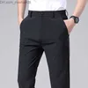 Pantaloni da uomo Pantaloni casual estivi per uomo da lavoro sottile elastico aderente in vita elastico jogger coreano classico sottile nero grigio blu stile uomo Z230801