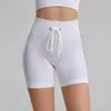 Pantaloncini attivi Sport senza cuciture per le donne Pantaloni da yoga con coulisse e pantaloni da fitness a vita alta da donna