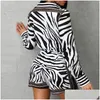 Zweiteiliges Kleid 2 Set Frauen Zebra-Druck geknöpftes Hemd und Reißverschluss-Shorts-Sets Lässige weibliche Herbst-Damenanzug-Drop-Lieferung Bekleidung C Dhqlx