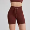 Pantaloncini attivi Sport senza cuciture per le donne Pantaloni da yoga con coulisse e pantaloni da fitness a vita alta da donna