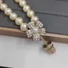 デザイナージュエリーネックレス新しい小さな香りの真珠の植木鉢ネックレス女性豪華なスタイルカラーチェーンチェーンネック