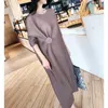 Sukienki swobodne miyake plisaty kobiet letnia sukienka 2023 Kołyk długi Twill Koreańska moda luźna projektant Big Button Nieregularna szata ubrania