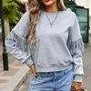 Vêtements de sport pour femmes à manches longues couleur unie gland décontracté simple col rond sweat à capuche