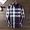 Camisa casual de diseñador de alta calidad para hombres Camisas de hombre Moda a cuadros geométricos Impreso manga larga solapa Business Fitness Camisa de hombre M-4XL