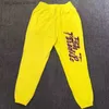 Pantaloni da uomo Giallo Pantaloni Hellstar American High Street Lettere Fiamma Stampa HELLSTAR Pantaloni sportivi di alta qualità Pantaloni corsetto Uomo Donna T230801