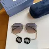 2023 luxury designer sunglasses New G Family Women's Love Earrings Chain Fashion Versatile Metal Frame Sunglasses 1031 UV Resistant