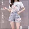 Zweiteiliges Kleid 2021 Sommerfrauen 2 Sätze Stickerei 3D-Blumen-T-Shirt Hinzufügen Denim-Shorts Vintage-Perlen-Drop-Lieferung Bekleidung Damen Cl Dhzbo