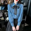 Camicette da donna 2023 Design Sense Camicia di jeans Versione coreana Straniero Bow Style Versatile Top Sweet Girl Bubble Sleeves Office Lady Elegante