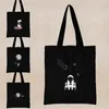 Sacs à provisions Kawaii sac noir blanc imprimé fourre-tout femmes épaule Shopper sacs à main décontractés Harajuku toile articles divers