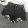 Kvinnors shorts sommar denim för kvinnor koreanska hög midja mångsidiga studenter lösa hål visar tunna a-line byxor trend