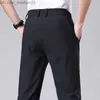 Pantaloni da uomo Pantaloni casual estivi per uomo da lavoro sottile elastico aderente in vita elastico jogger coreano classico sottile nero grigio blu stile uomo Z230801