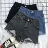 Kvinnors shorts sommar denim för kvinnor koreanska hög midja mångsidiga studenter lösa hål visar tunna a-line byxor trend