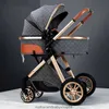 Hochformatiger 2-in-1-Kinderwagen, der sitzen, liegen, die Richtung ändern, stoßdämpfend sein und den Handwagen für neugeborene Kinder zusammenklappen kann