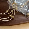Naszyjniki wisiorek Wykwintny srebrny kolor kwadratowy naszyjnik z koralikami elegancki łańcuch na szyję piłkę dla kobiet modna biżuteria klasyczna biżuteria urok biżuterii