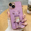 携帯電話ケースラグジュアリーメッキ3Dドールフォールドスタンドスタンドソフトシリコン電話ケースiPhone 14 13 12 Pro Max 11 Mini X XR XS 7 8 Plus SE 3 Cute Cover L230731