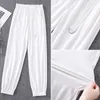 Calça feminina primavera 2023 folgada casual cintura elástica coreana nove pontas cor sólida macacão A376