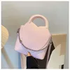 Véritable sac en peau de vache seau femmes une épaule bandoulière designer sac à main Litchi chaîne de grain décoration fourre-tout luxe shopping sacs à main en cuir sac à dos2024