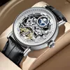 Нарученные часы Kinyued Luxury Skeleton Tourbillon Dial Design Mens Watch Top Brand Водонепроницаемые повседневные автоматические механические часы Мужчины