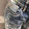 Męskie dżinsy 2023 Męskie wzór streetwearu szwy chude szczupły fit High Street Umyjane pomalowane dżinsowe piszczał