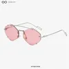 Occhiali da sole Fashion Classic Rimless Cool Men Vintage Luxury Design Occhiali da sole in metallo Donna Shades UV400